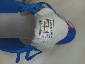 Sport Shoe/ታኬታ