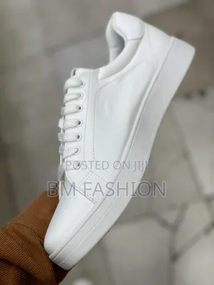 Lacoste Low Tops: The Bold White Shoes