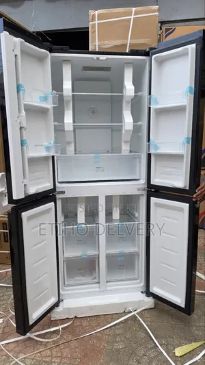 This Refrigerator Is a Black Four-Door French Door Model With