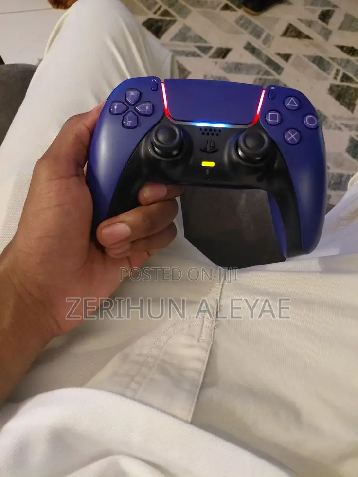 Ps 5 ኦሪጂና ል Controller