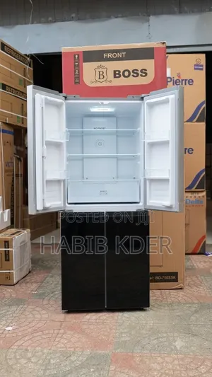 ￼ ￼ +4 This Is a Boss Brand 4-Door Refrigerator Featuring a Black