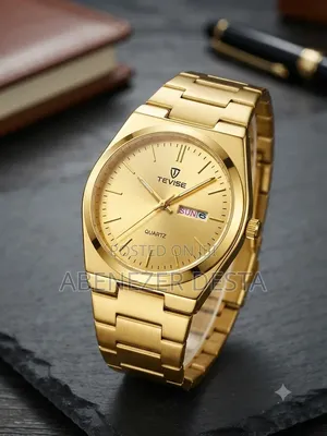 Tevise Watch Features a Prominent Gold- Tone Stainless Steel Band