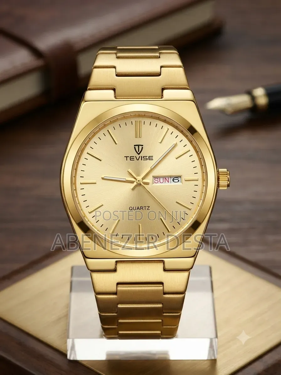 Tevise Watch Features a Prominent Gold- Tone Stainless Steel Band