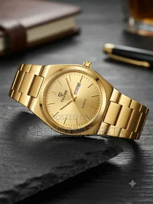 Tevise Watch Features a Prominent Gold- Tone Stainless Steel Band