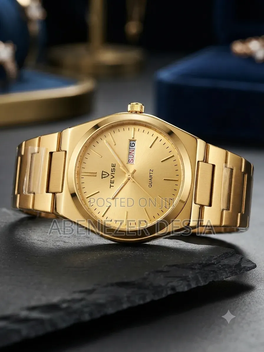 Tevise Watch Features a Prominent Gold- Tone Stainless Steel Band