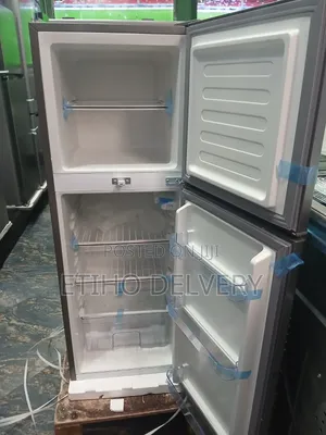 This Evergreen Branded, Top-Freezer Refrigerator Features a Sleek Sil