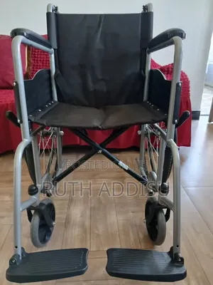 Lightweight Travel Wheelchair by Drive Medical Features Black Nylon