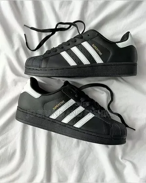 Black and White Adidas Superstars