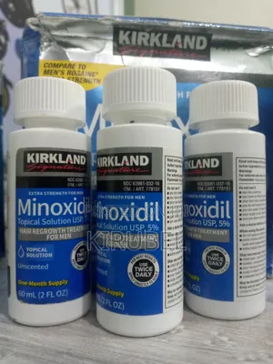 ፀጉራቹን ከመርገፍ ወደ እድገት በ Liquid Minoxidil