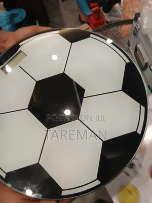 ,Digital Glass Weighing Scale Designed to Look Like a Soccer Ball.