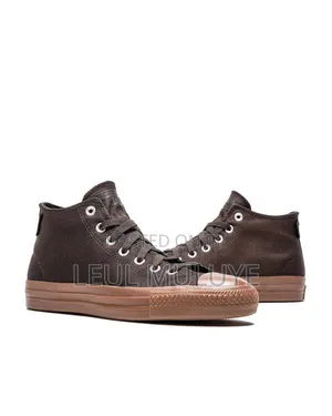 The Converse Chuck Taylor All Star Pro Mid in Velvet Brown
