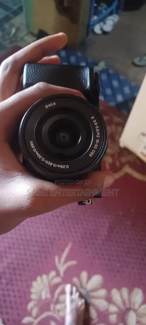 Sony Alpha A6000 Mirrorless Camera + 16-50mm OSS Lens in 1 Extra .
