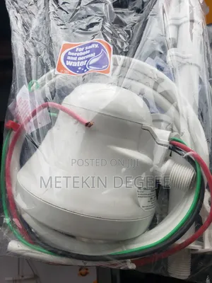 Electric Shower Head Packaged in Plastic.