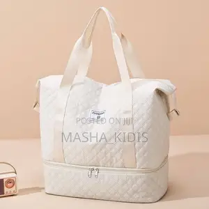 Oversized Travel Duffel Features a White Quilty