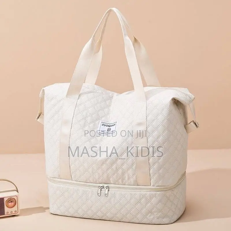 Oversized Travel Duffel Features a White Quilty