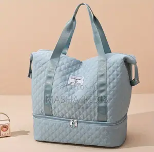 Oversized Travel Duffel Features a White Quilty