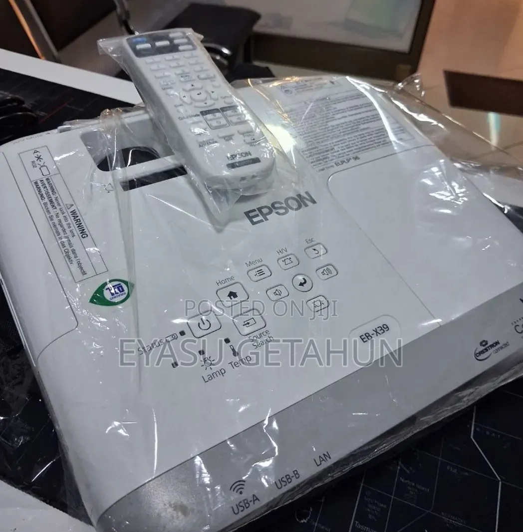 BRAND NEW EPSON Projector 
Has Remote 
Model Name: EB-x39