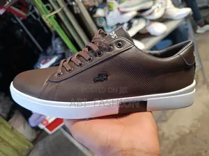 Lacoste Casual Sneakers Feature a Dark Gray Rubber Sole