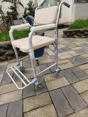 OrtoPrime Toilet Shower Chair With Folding Wheels and Feet – 3 ዊልቸር