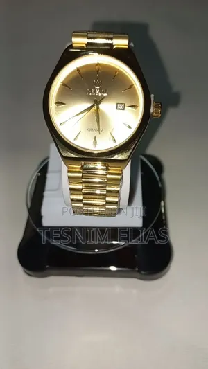 RETAL Gold Quartz Watch With Date Display