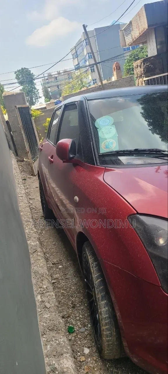 Suzuki Swift 2009 Burgundy