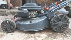 Lawn Mower(የሳር ማጨጃ)