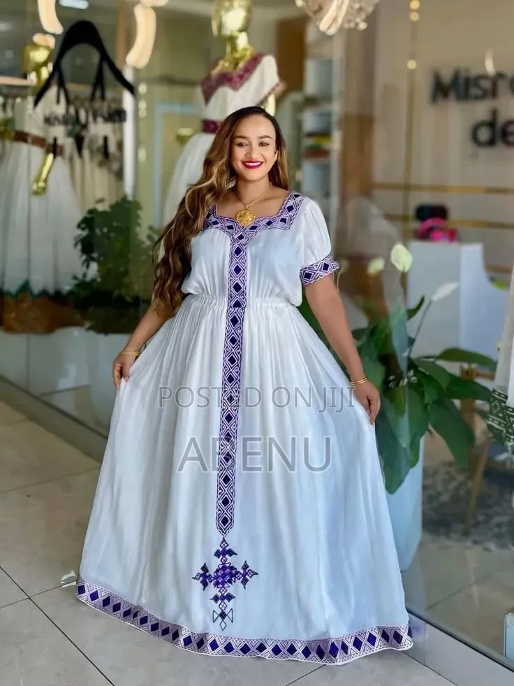 Elegant White Blue Habesha Kemis – Ethiopian Traditional Dress