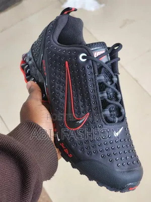 Black Nike Shox Model Featuring a "Just Do It"