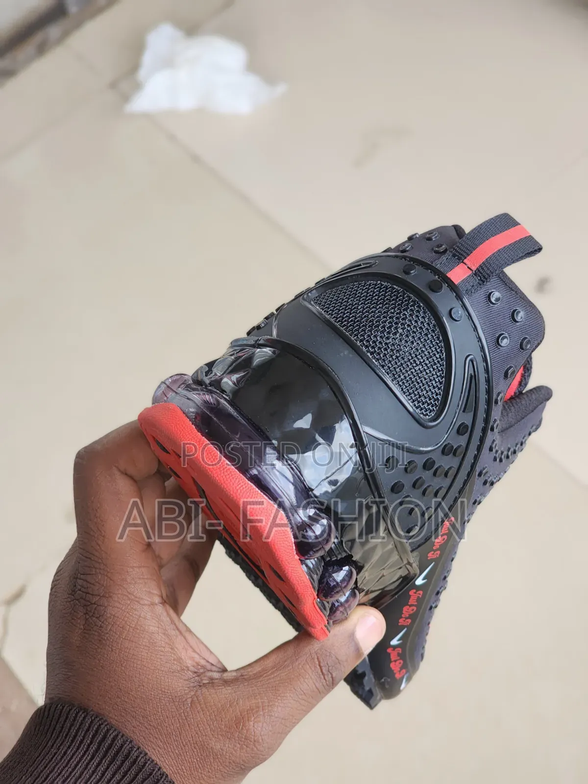 Black Nike Shox Model Featuring a "Just Do It"