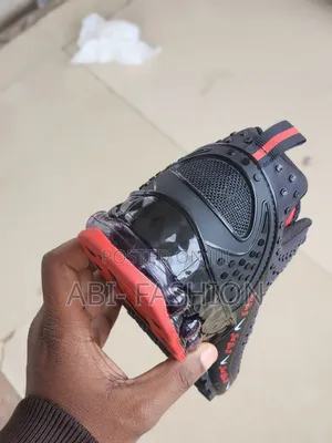 Black Nike Shox Model Featuring a "Just Do It"