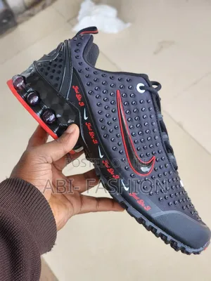 Black Nike Shox Model Featuring a "Just Do It"