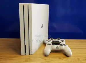 PS4 Pro Model | 2 Controllers | 5 Games