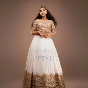Elegant White Gold Habesha Kemis – Traditional Ethiopian Dress