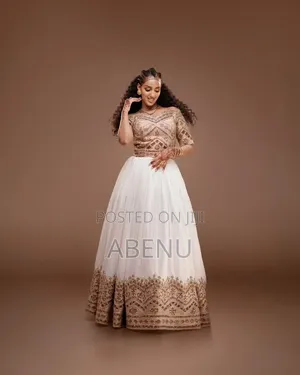 Elegant White Gold Habesha Kemis – Traditional Ethiopian Dress