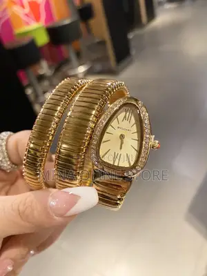 Women's Watch With a Snake Shaped Head Wrapped Around the Strap
