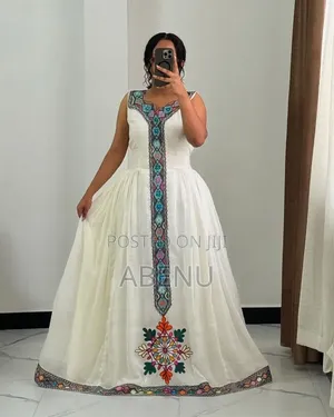 Elegant White Habesha Kemis With Colorful Traditional Tibeb Embroidery