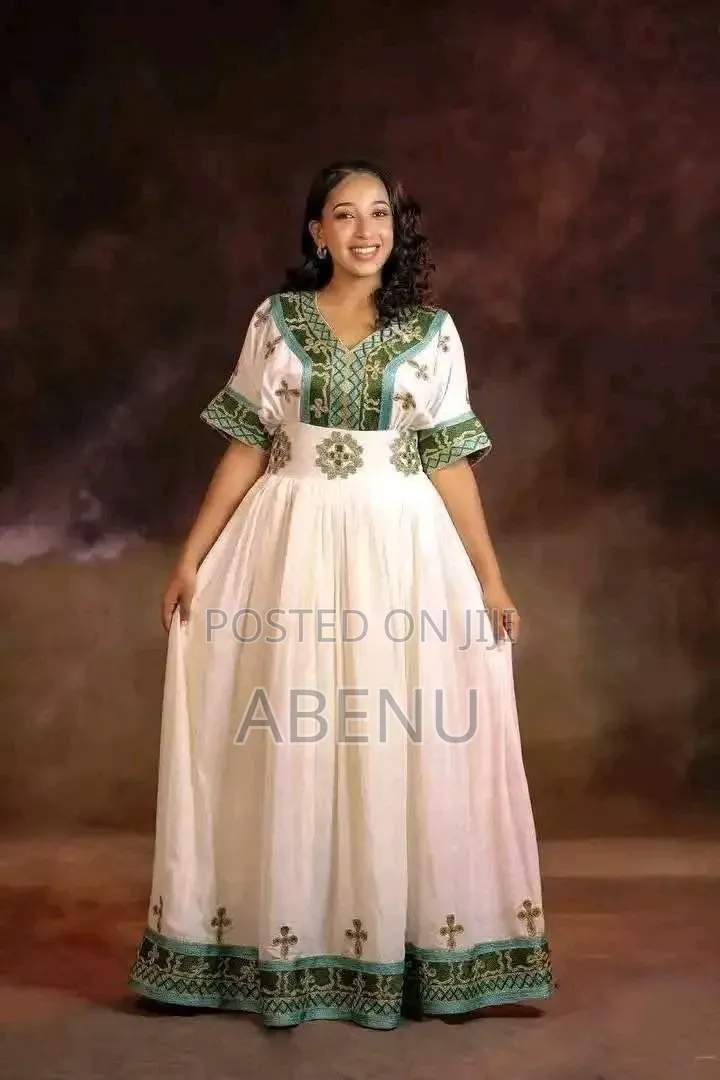 Elegant White Habesha Kemis With Colorful Traditional Tibeb Embroidery