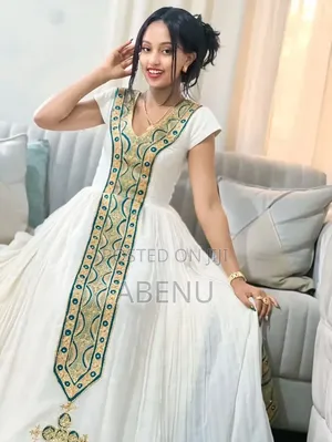 Elegant White Habesha Kemis With Green Gold Embroidery