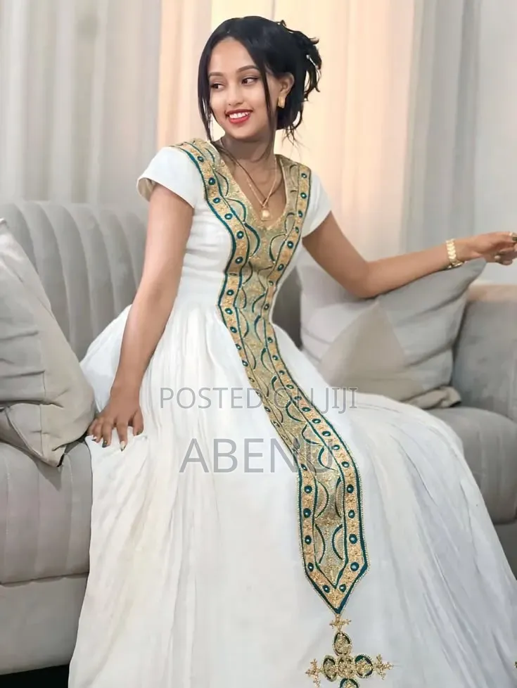 Elegant White Habesha Kemis With Green Gold Embroidery
