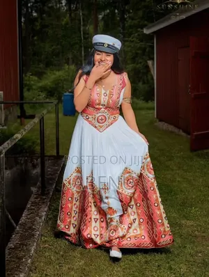 Elegant Strapless Habesha-Inspired Corset Gown in White Coral