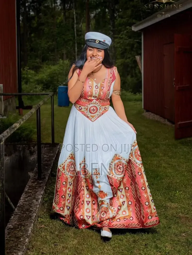 Elegant Strapless Habesha-Inspired Corset Gown in White Coral