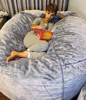 ምቹ መቀመጫ ከተጨማሪ ትራስ ጋር