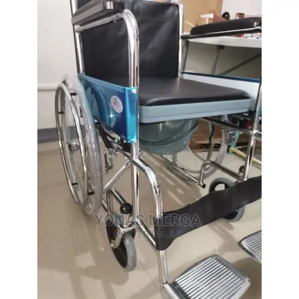 Wheelchair With Mag Rear Wheel Fixed Armrest Footrest