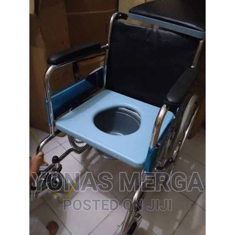 Wheelchair With Has Big Wheels With Hand Railings