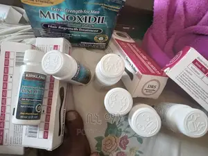 Minoxidil(5%) and Derma Roller