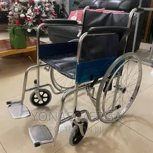 Adult Wheelchair - Chromed Steel Frame, Fixed Arm Footrest
