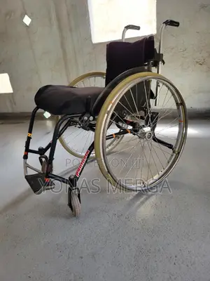 Wheelchair in Ethiopia=Wheelchair in a/a/Wheelchair/ዊልቼር/Use