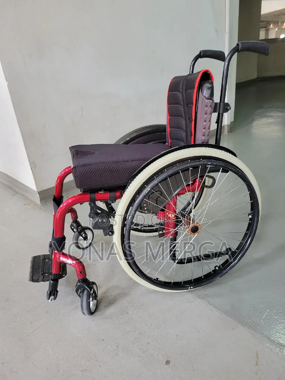 American Wheelchair Placed Behind the Car, Saving Space,