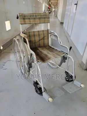 Used Attendant Propelled Wheelchair Made of Chrome Steel
