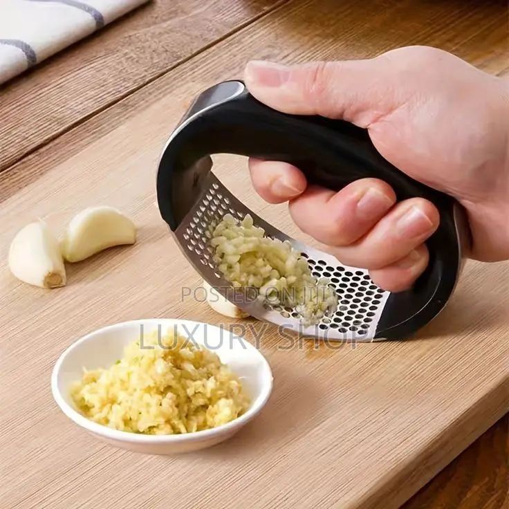 ነጭ ሽንኩርት / ጅንጅብል ማድቀቂያ Garlic Press Chopper